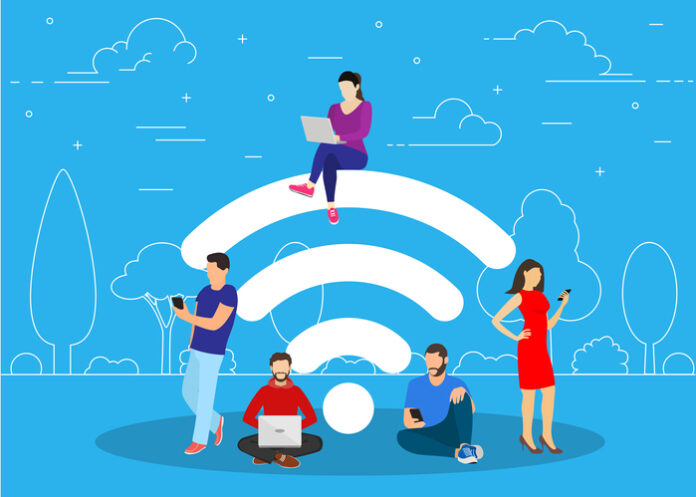 Animated image of people standing next to a Wi-Fi logo